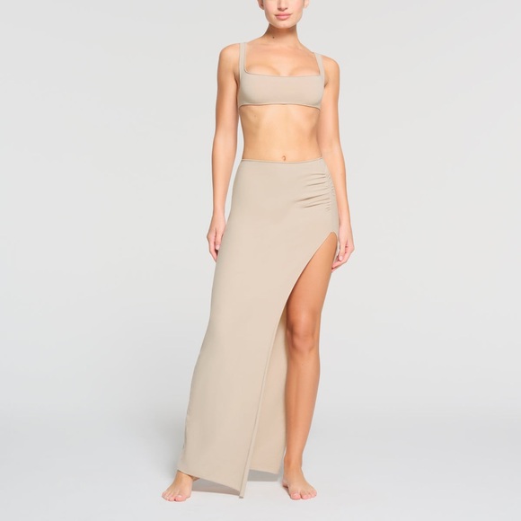 SKIMS Dresses & Skirts - SKIMS RAW EDGE SLIT LONG SKIRT in Stone NEW